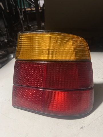 Задній правий зовнішній ліхтар 63211384010 BMW