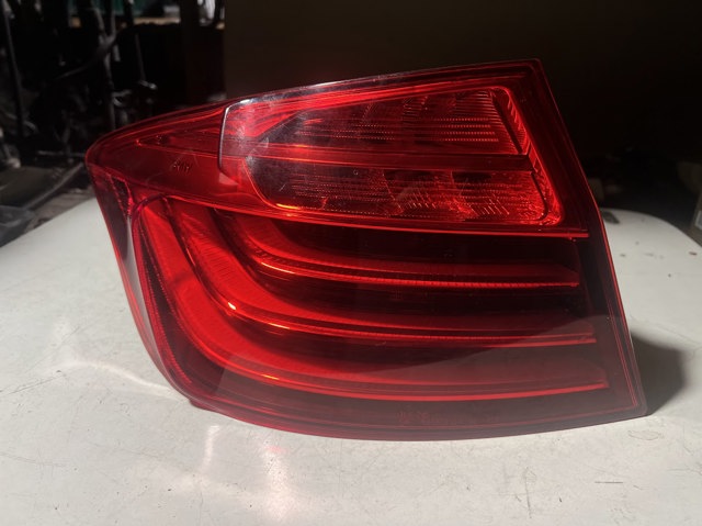 Задній лівий зовнішній ліхтар 63217312707 BMW