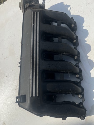 Колектор впускний 7792019 BMW