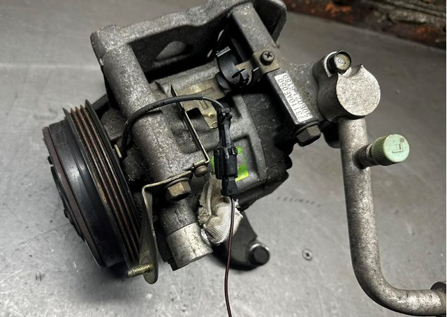 Компресор кліматичної установки 73111AE021 SUBARU