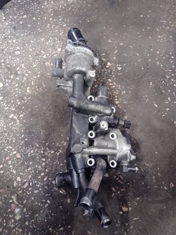 Корпус термостата в зборі 256102F700 HYUNDAI