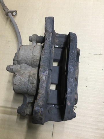 Ремкомплект заднього гальмівного супорта 26225AG070 SUBARU