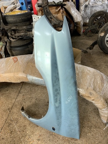 Ліве переднє крило 57110FE190 SUBARU