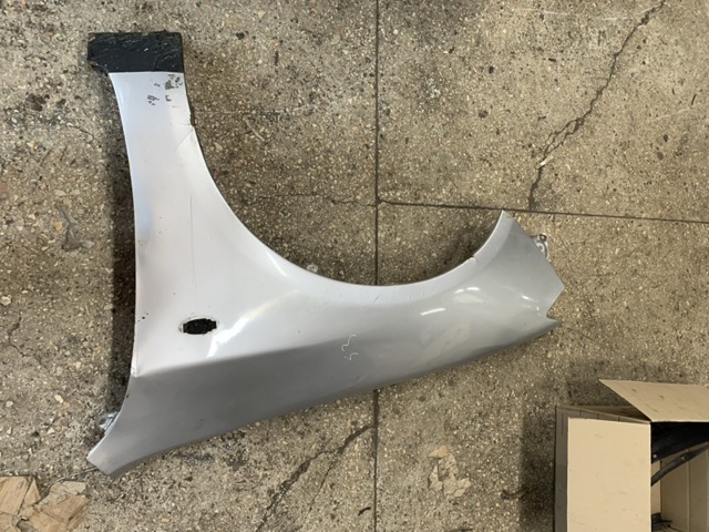 Ліве переднє крило 57120FG0309P SUBARU