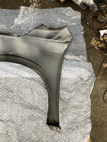 Переднє праве крило 57120SG0209P SUBARU