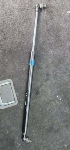 Опора капота ліва 57251AJ010 SUBARU