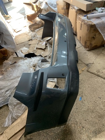 Кожух бампера заднього 57704AJ020 SUBARU