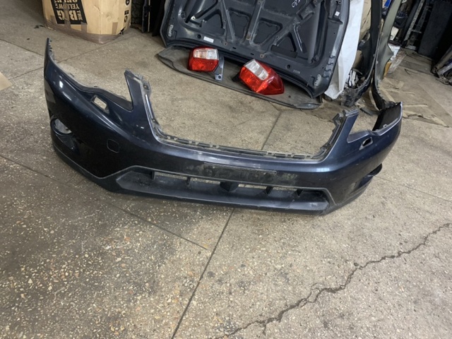 Кожух бампера переднього 57704FJ010 SUBARU