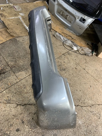 Кожух бампера заднього 57704SA012 SUBARU
