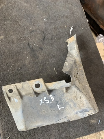 Лівий кронштейн заднього бампера 57731FG030 SUBARU