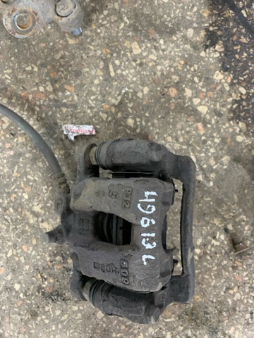 Задній гальмівний супорт лівий 58210D7000 HYUNDAI