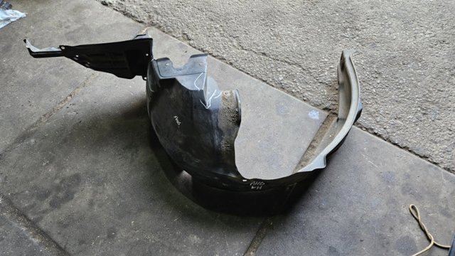 Підкрилок передній лівий 59110AG011 SUBARU