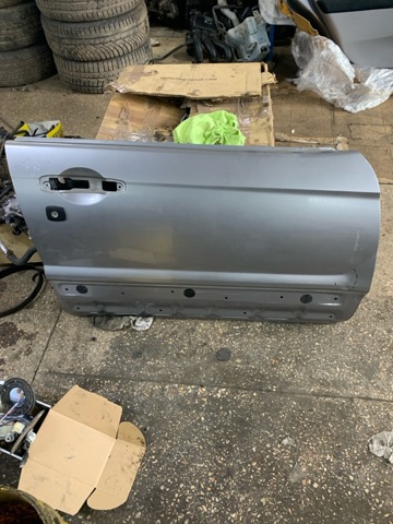 Пасажирські передні двері 60009SA1219P SUBARU