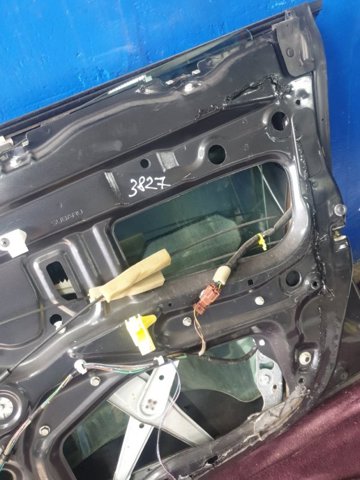 Скло пасажирських дверей 61011AG000 SUBARU