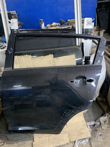 Двері пасажирськи задні ліві 770033W000 HYUNDAI