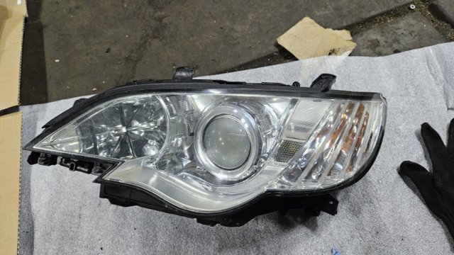Фара ліва 84001AG390 SUBARU