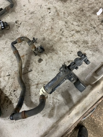 Тримач форсунки омивача фари, підйомний циліндр 86636AG300 SUBARU