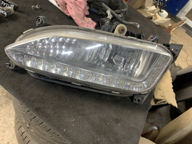 Ліва протитуманна фара 922012W100 HYUNDAI