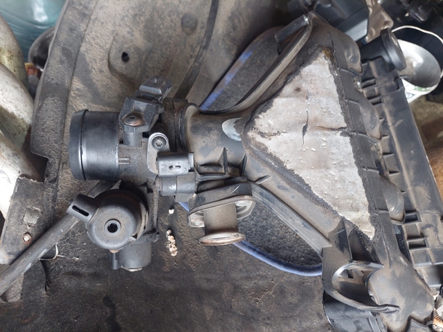 Дросільна заслінка в зборі 1251250 FORD