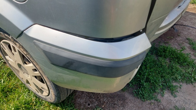 Молдинг бампера заднього, лівий 1431029 FORD