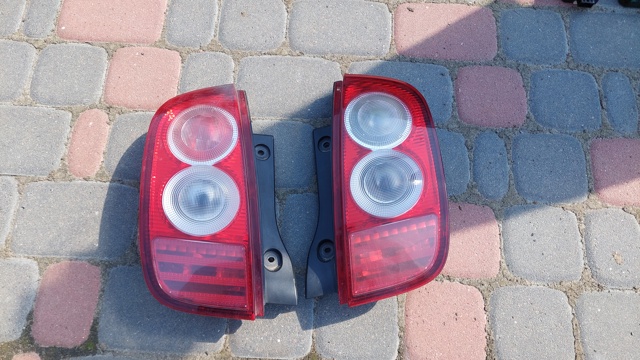 Задні ліхтарі 26550AX710 NISSAN