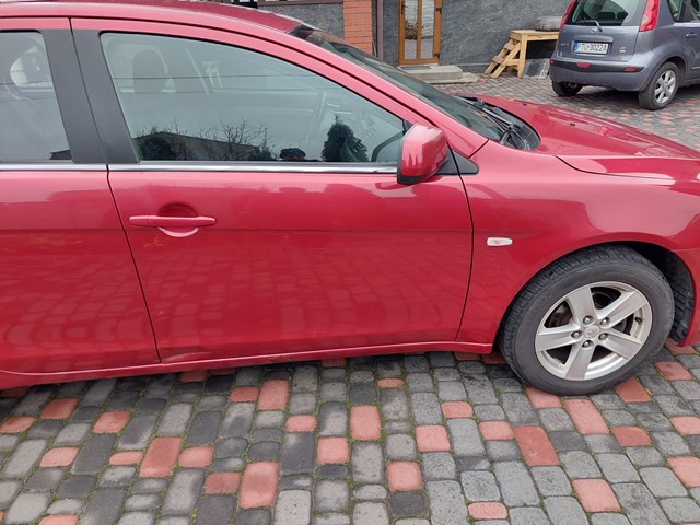 Дверка передня права 5700A558 MITSUBISHI