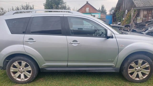 Ручка лівих дверей зовнішня 5716A013HC MITSUBISHI
