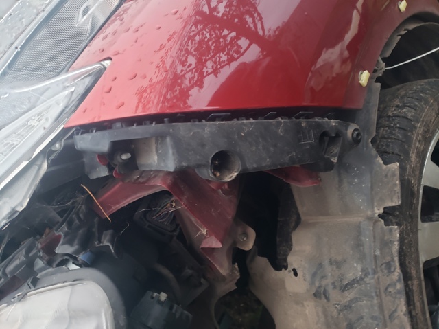 Кронштейн бампера переднього, лівий 62223BV80A NISSAN