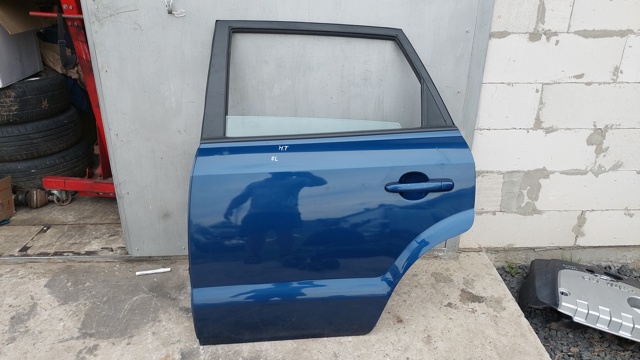 Двері пасажирськи задні ліві 770032E020 HYUNDAI