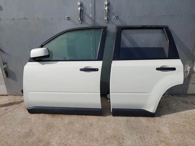 Скло заднє ліве 82301JG100 NISSAN