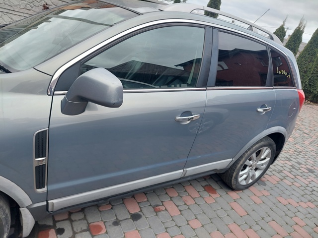 Скло водійських дверей 96624296 OPEL