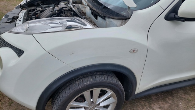 Переднє ліве крило F31011KKAA NISSAN