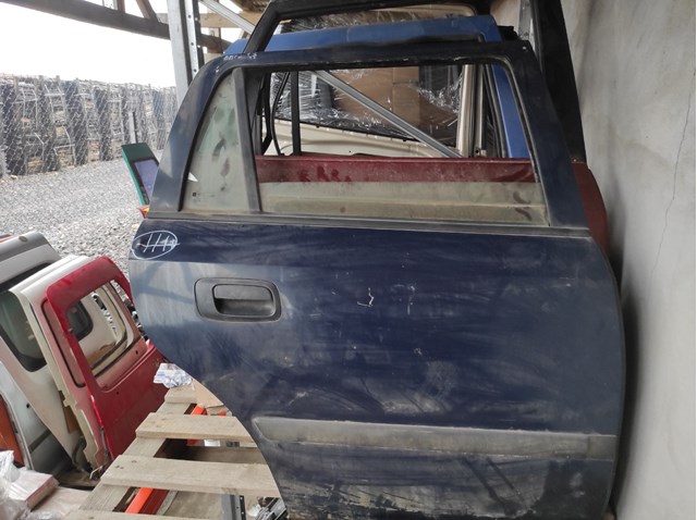 Двері пасажирські задні праві 124542 OPEL