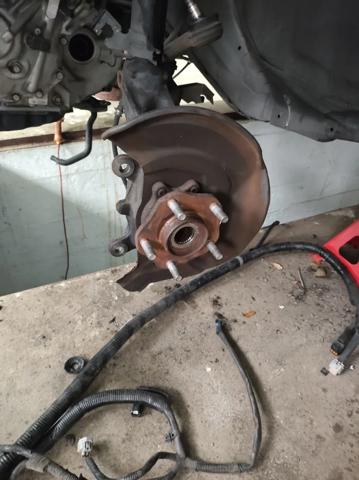 Кулак поворотний передній лівий 400154BA0A NISSAN