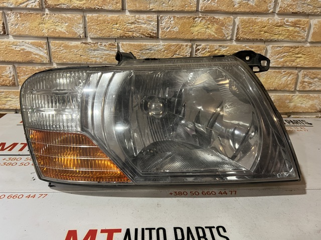 Фара передня права 10087420 MITSUBISHI