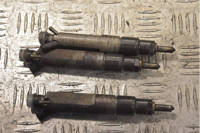 Форсунки електромагнітні 028130203F VAG