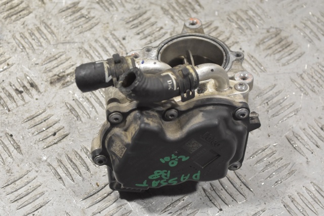 Дросільна заслінка в зборі 04L128059AA VAG