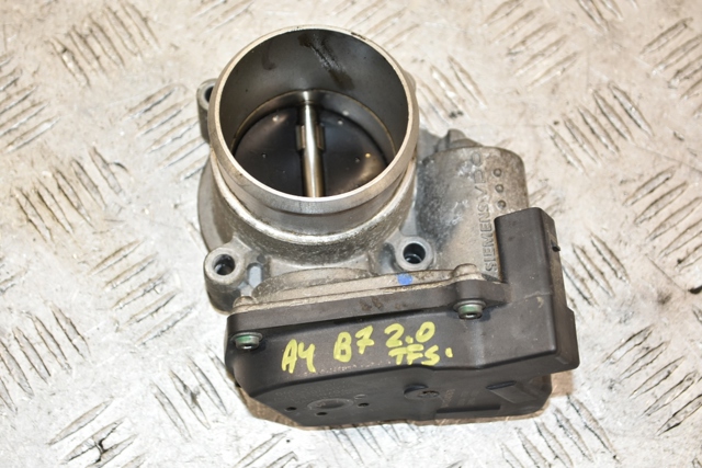 Дросільна заслінка в зборі 06F133062E VAG
