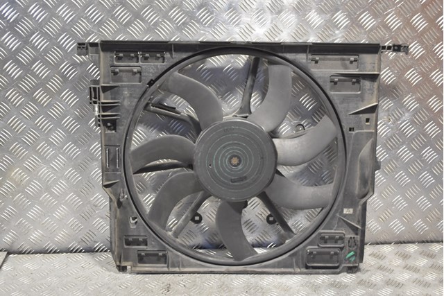Вентилятор радиатора 7 лопастей в сборе с диффузором (дефект) bmw (f10/f11) 17427612453