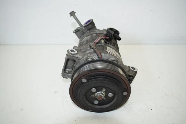 Компресор системи кондиціювання 39034464 OPEL
