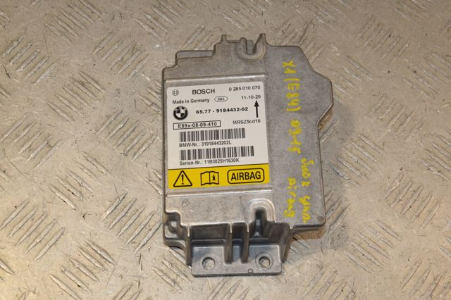 Блок управління airbag 65779184432 BMW