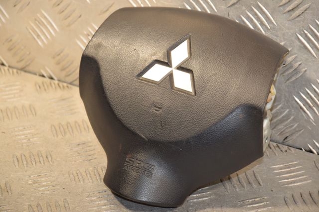 Подушка в кермі 7030A088XA MITSUBISHI