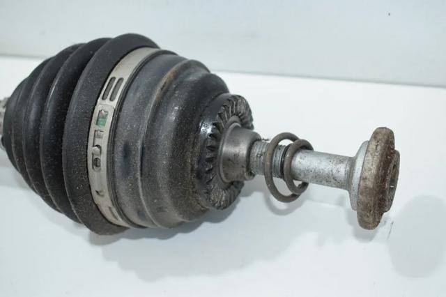 Піввісь передня ліва 7597693 BMW