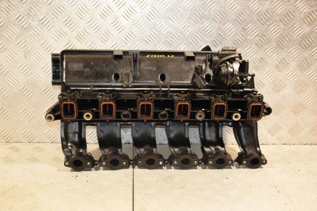 Колектор впускний 7790700 BMW