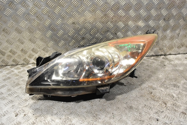 Основна фара в зборі ліва BDG751040 MAZDA