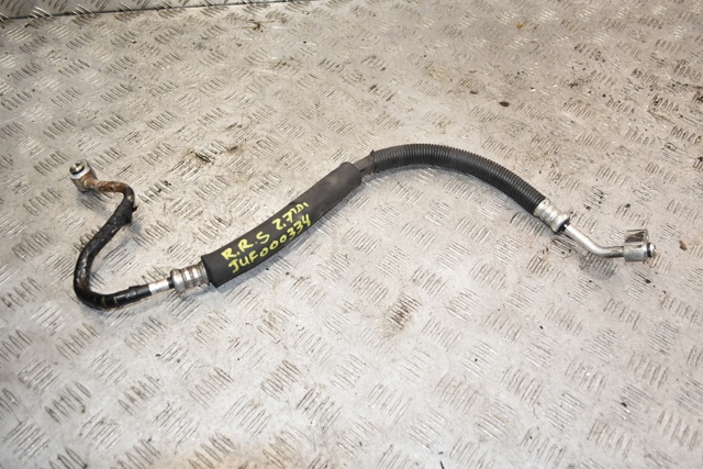 Трубка кондиціонера від компресора до радіатора JUF000334 LAND ROVER