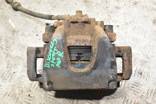 Супорт гальмівний, передній, правий LR061369 LAND ROVER