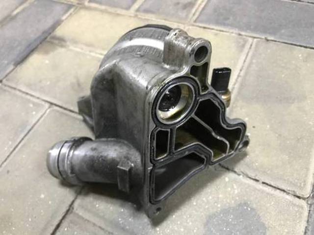 Корпус масляного фільтра 11428683206 BMW