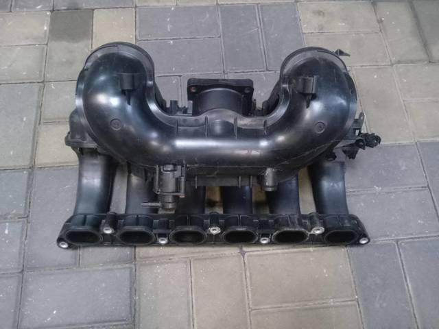 Колектор впускний 11617559523 BMW