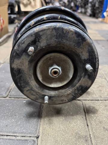 Подушка амортизатора переднього 31331090611 BMW